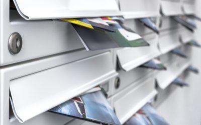 Modern mailboxes filled of flyers. Business and advertising concepts. Shallow depth of field.